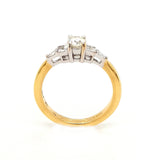 18ct Gold Round and Emerald Cut Diamond Ring