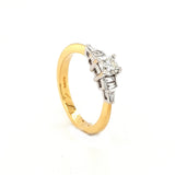 18ct Gold Round and Emerald Cut Diamond Ring