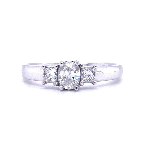 18ct White Gold Oval and Princess Three Stone Engagement Ring