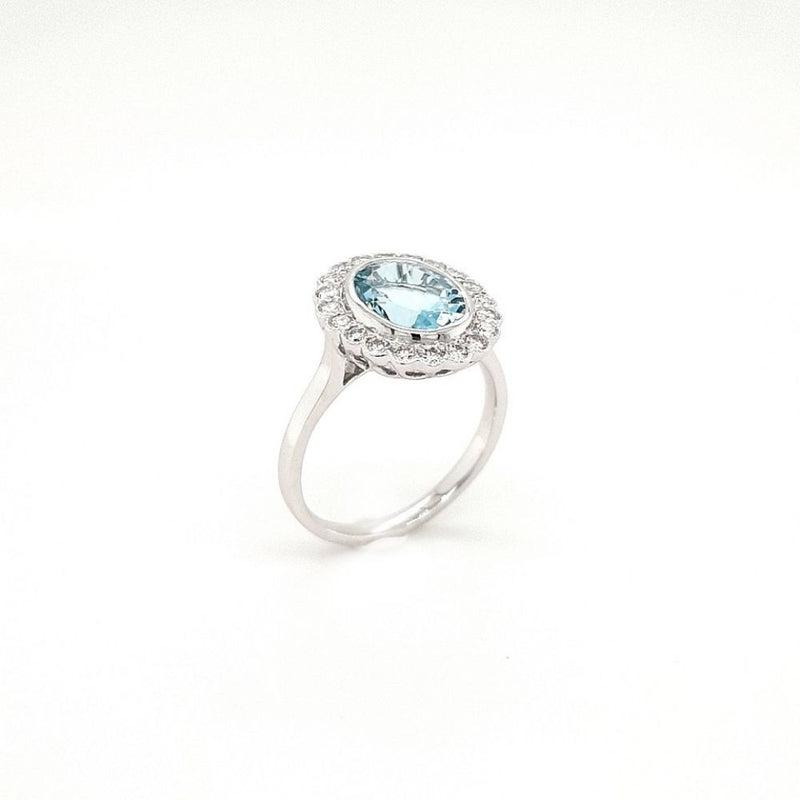 18ct White Gold 0.31ct Aquamarine and 0.43ct Diamond Engagement Ring